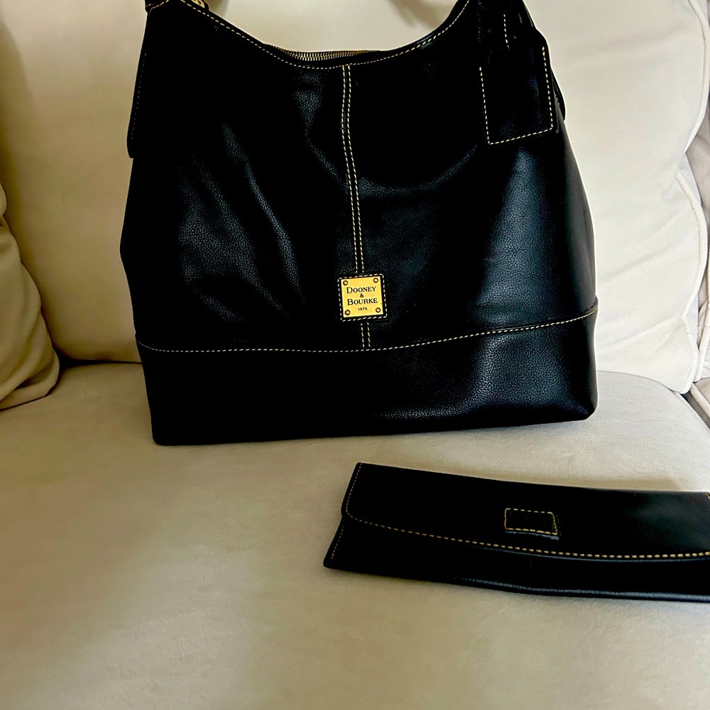Dooney and Bourke slouch black leather purse includes charge card wallet